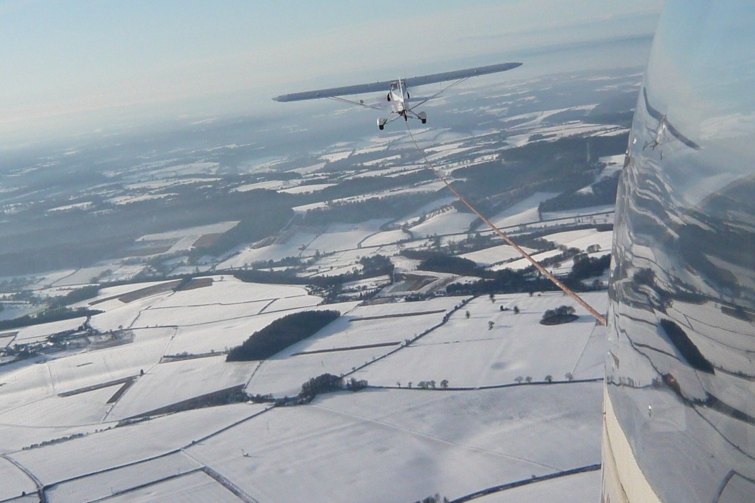 SnowGliderTug16x9 Booker Gliding Club